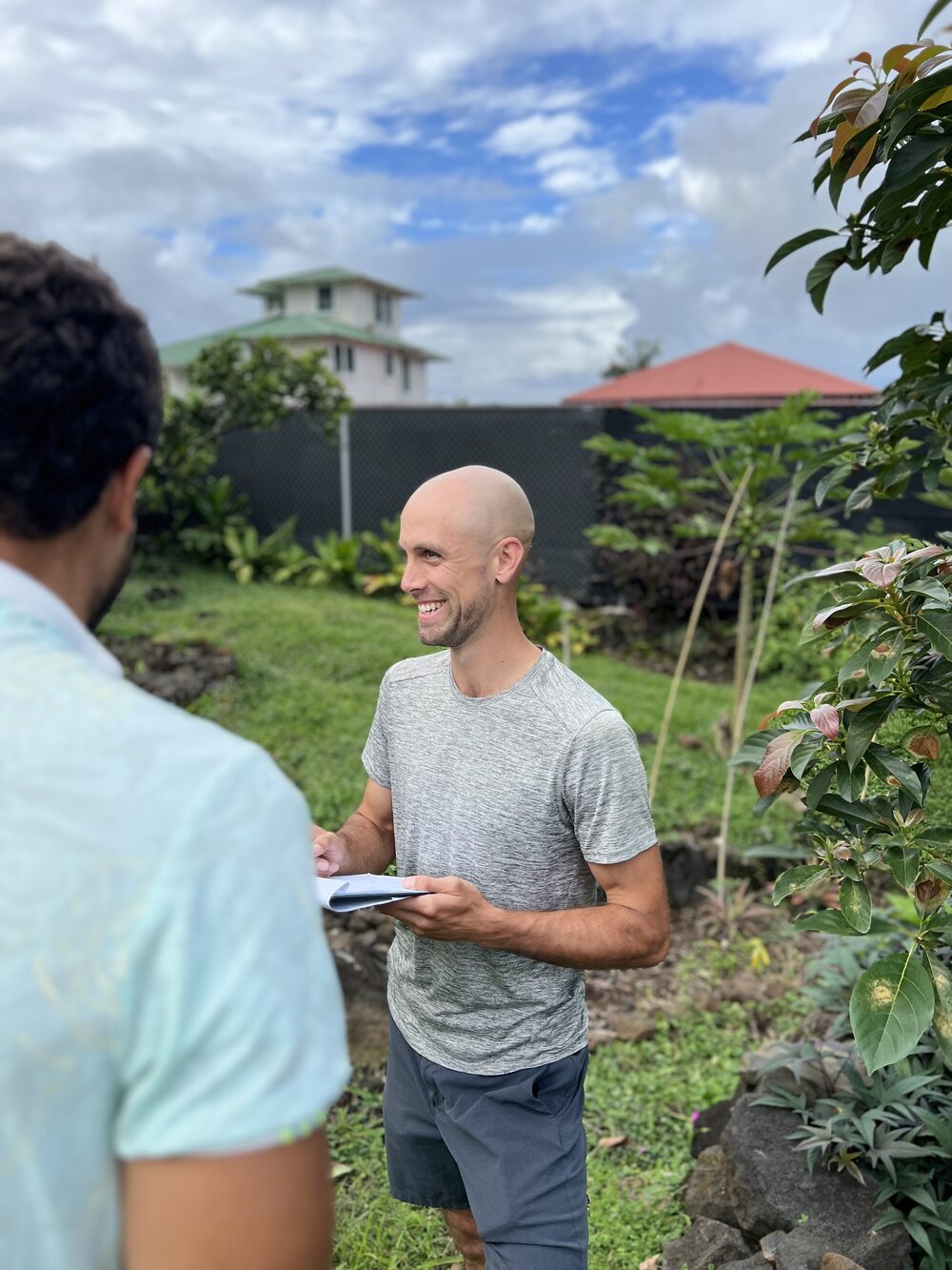 Erik consulting with a client on their property